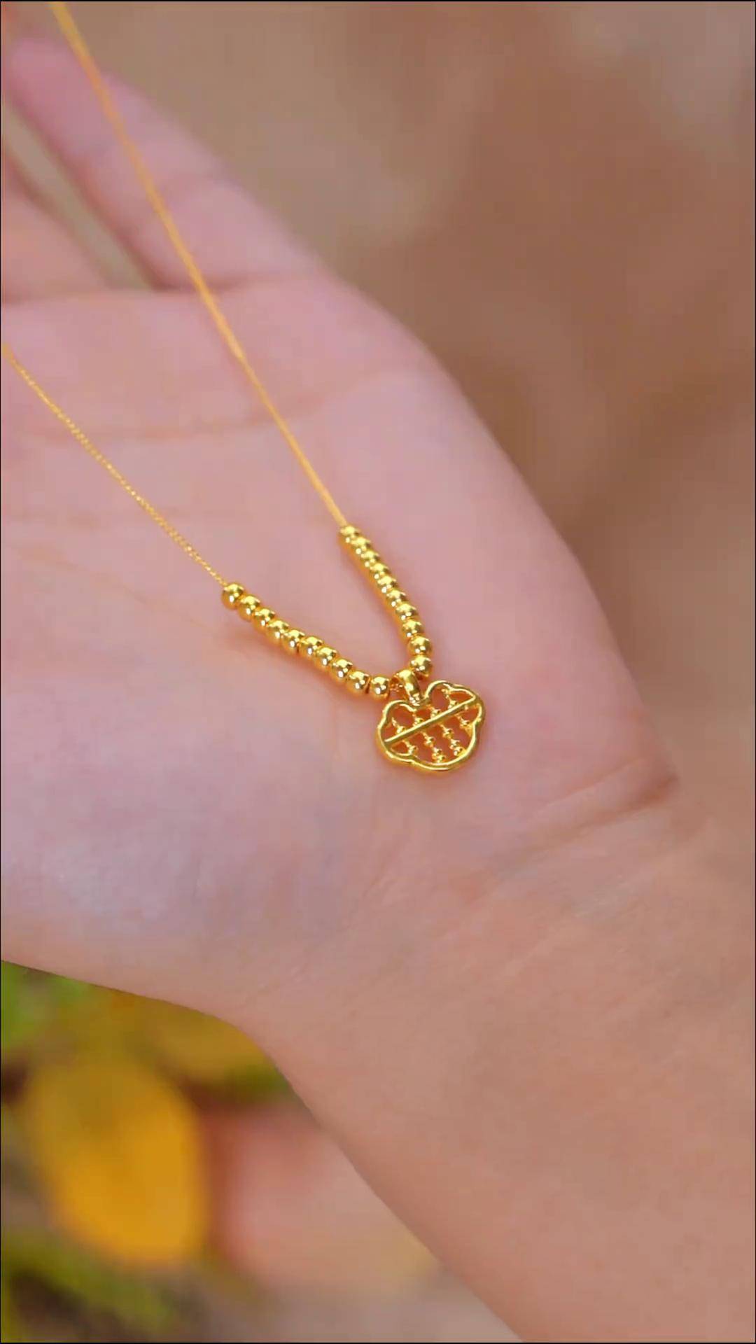 中国黄金获得外观设计专利授权：“项链（花轿喜事系列-幸福翩然）”